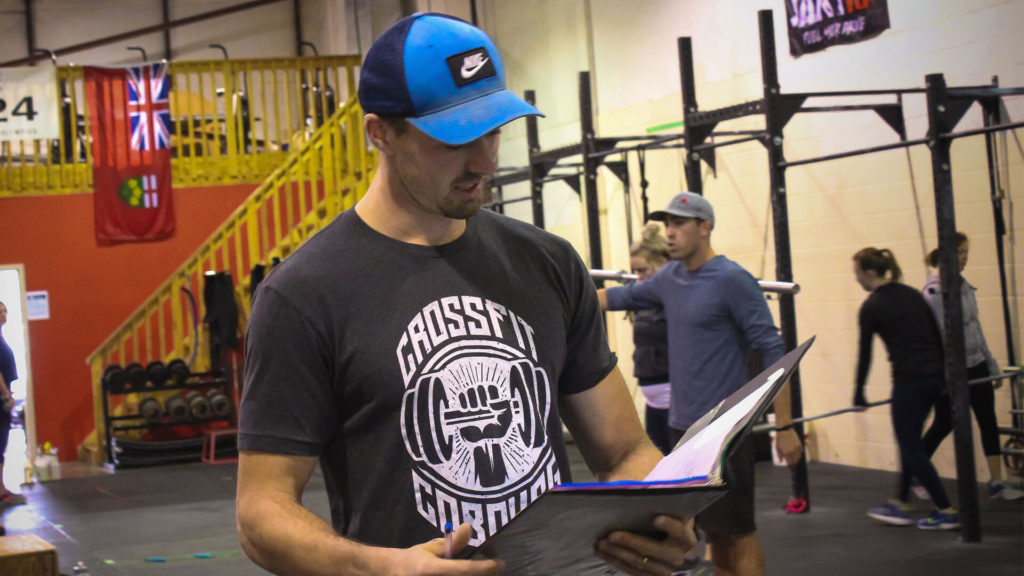 crossfit coach going over the details
